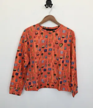 Emily Lovelock Orange Print Top