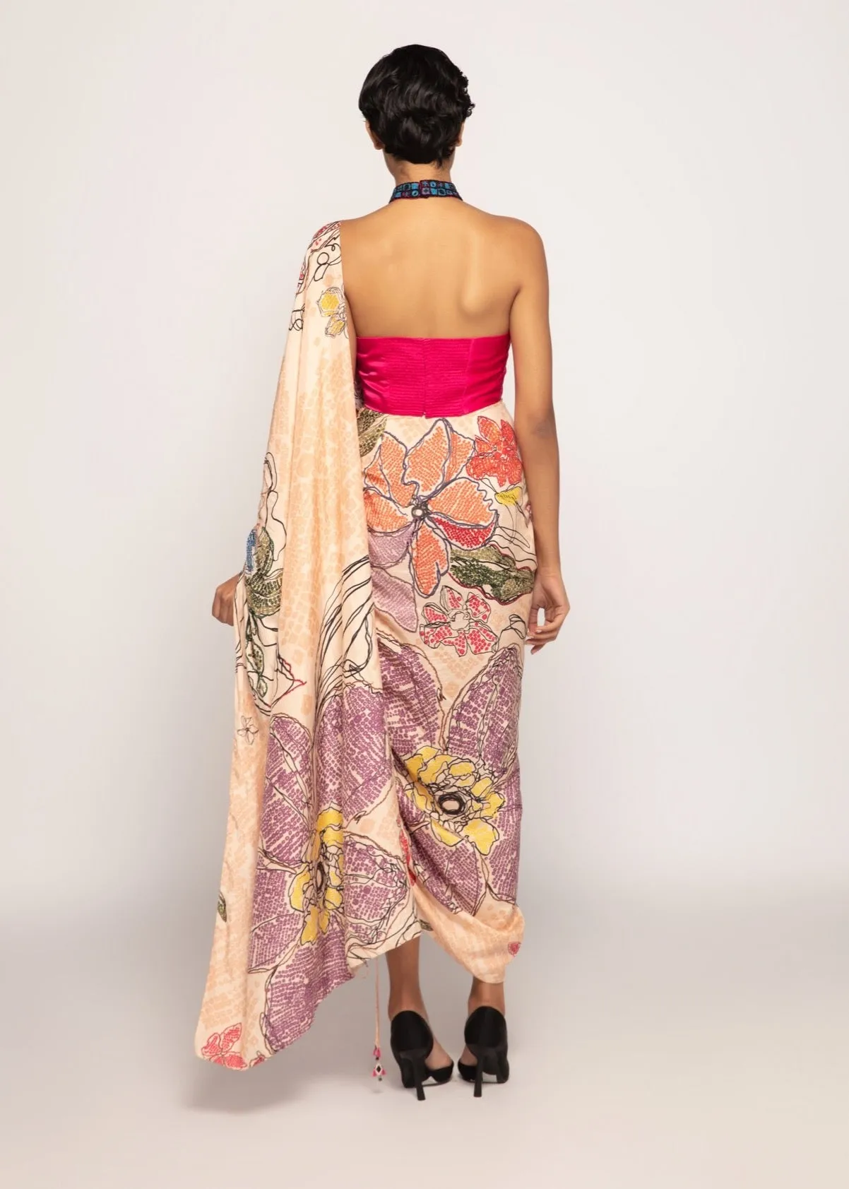 Hot pink halter blouse and draped sari