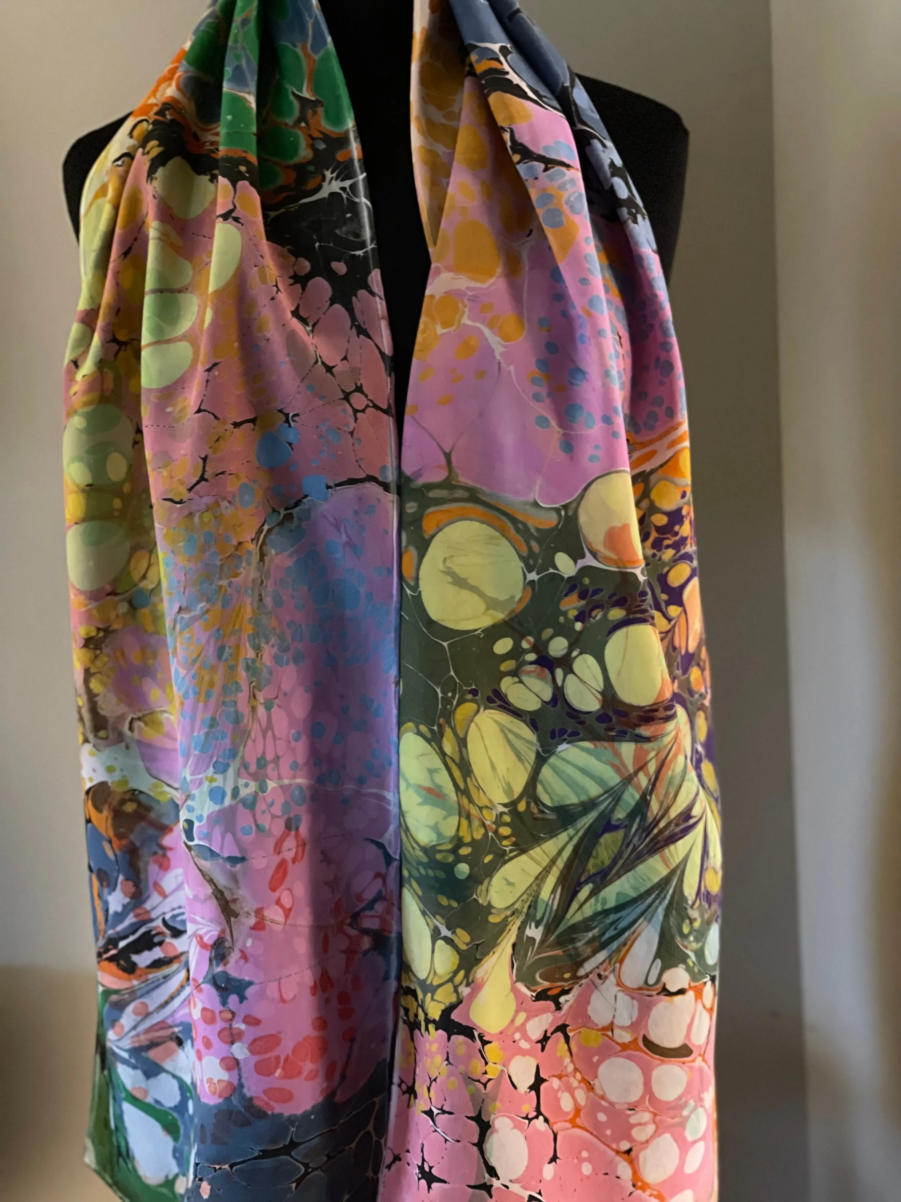 Summer color twice marbled Charmeuse Silk 72x14” bold fun. This beautiful silk makes a unique dresser cover and scarf