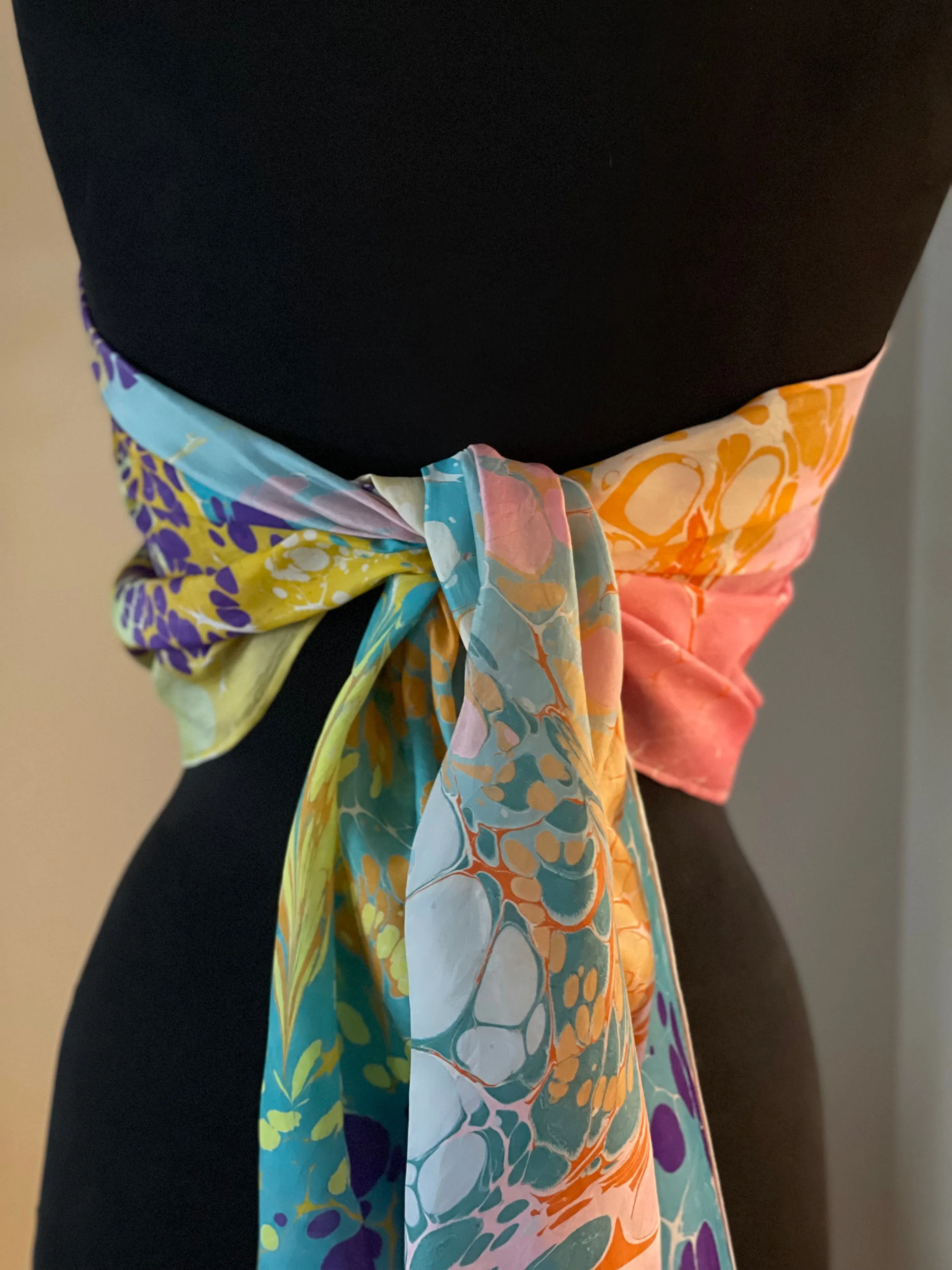 Summer color   water marbled 8mm Habotai silk.  Hang on the wall, use as a table runner or wear this unique piece