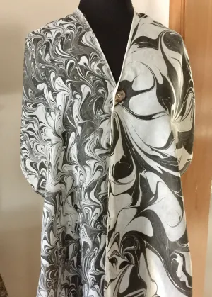 The Shibumi.  It’s a wrap, a shawl, a fashion statement!  Wear it 10 different ways!