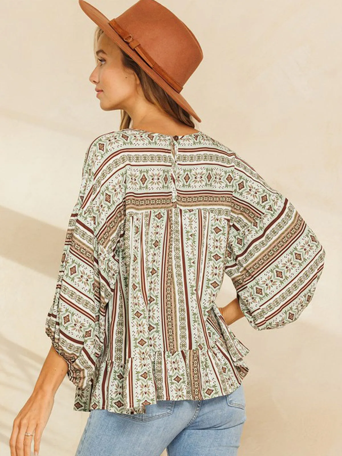 WOMEN'S 3/4 SLEEVE RUFFLE BOTTOM HEM MULTI PRINT TUNIC TOP