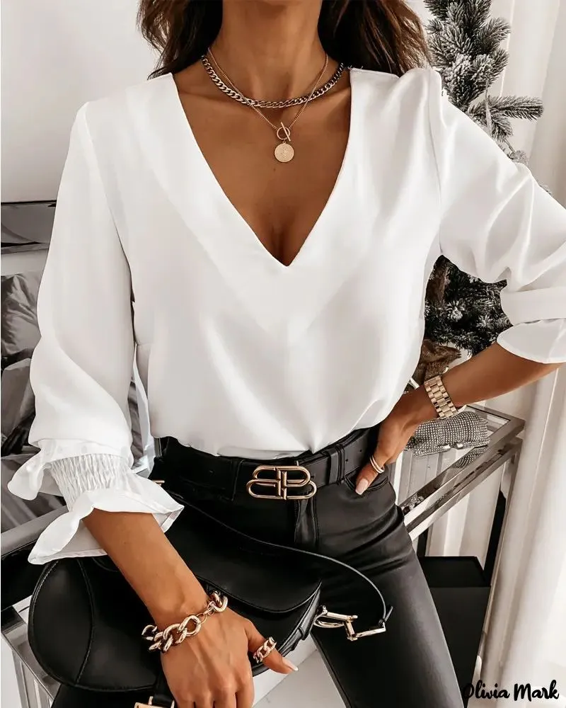 Xieyinshe - Long Sleeve V-Back Top with Chain Decor