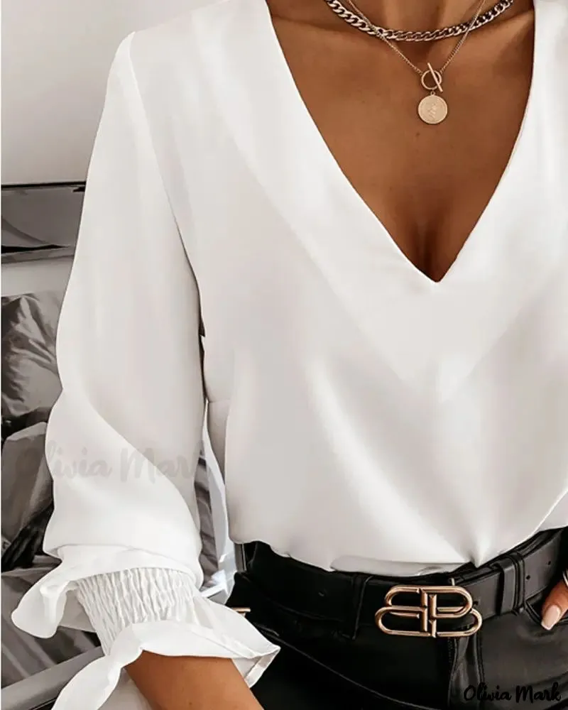 Xieyinshe - Long Sleeve V-Back Top with Chain Decor
